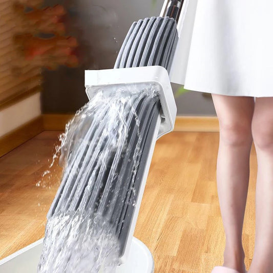 Steven Store™ Absorbent Wringer Mop - Ultra-absorbent microfiber head with built-in wringer mechanism and 360-degree swivel for efficient and effective floor cleaning.
